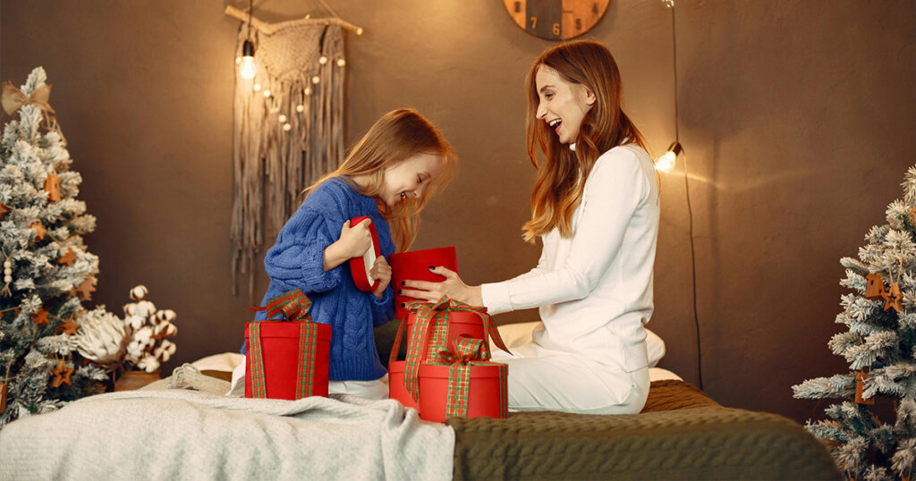 Mother and Daughter Opening Christmas Presents
