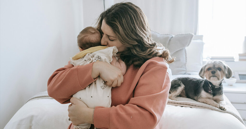 Mom loving newborn