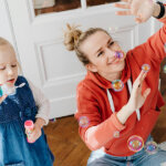 A Girl Blowing Bubbles