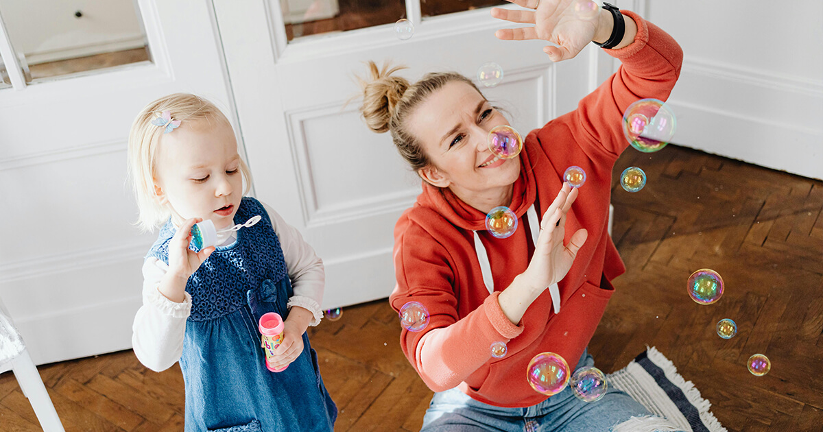 A Girl Blowing Bubbles