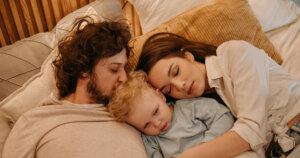 Family Lying on Bed