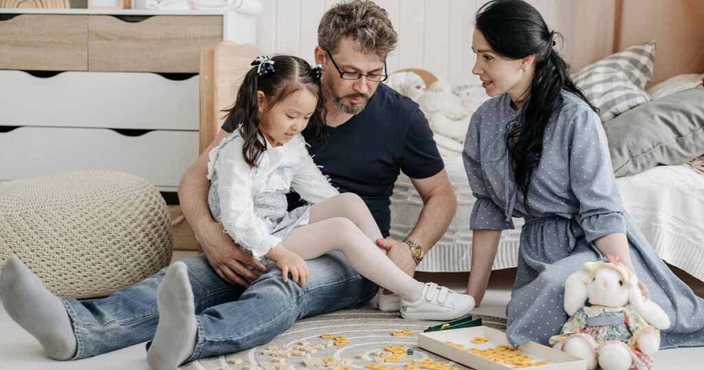 Family Playing Scrabble