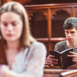 A Man and a Woman Reading the Bible