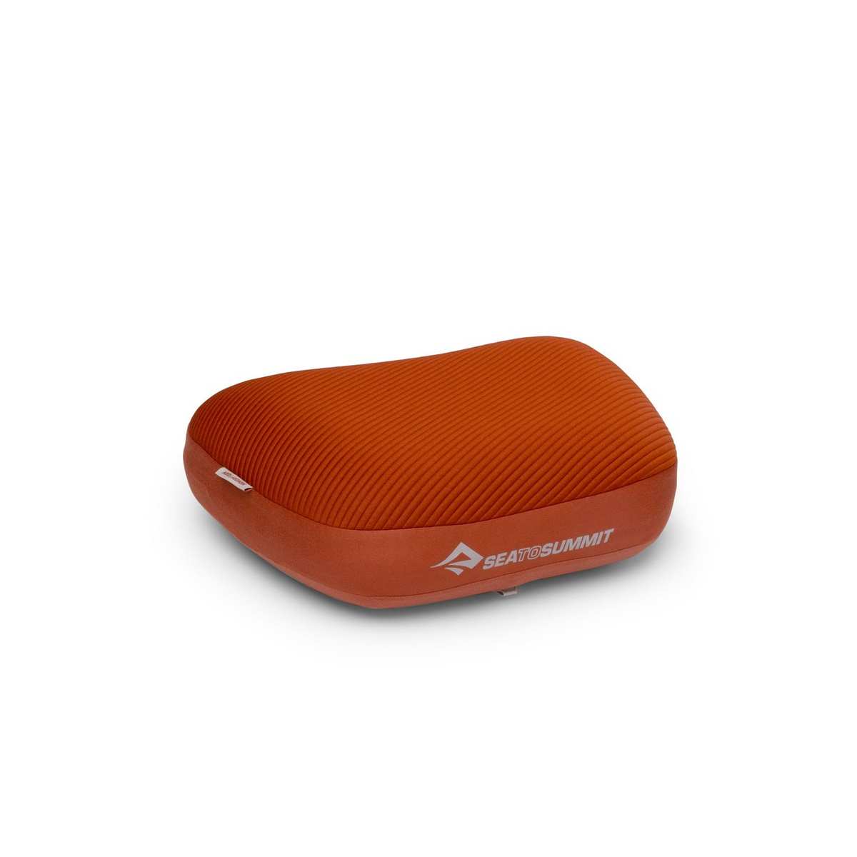 Orange Sea to Summit Aeros Premium Pillow shown fully inflated on white.