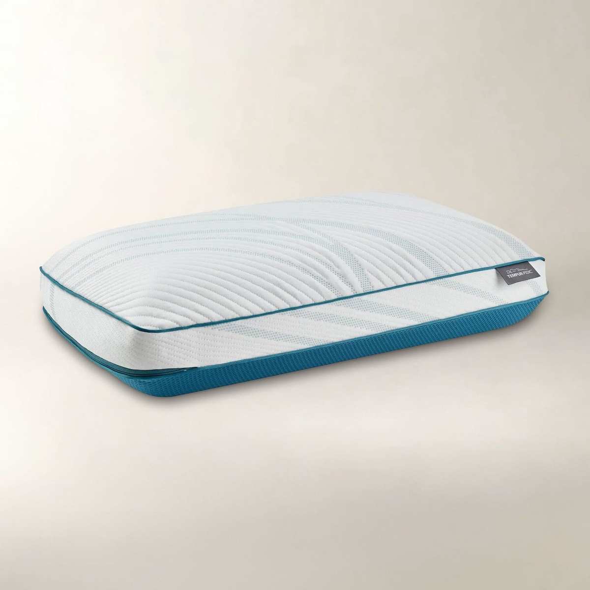 The Tempur-Pedic TEMPUR-Adapt ProHi pillow with a white textured cover and teal trim.