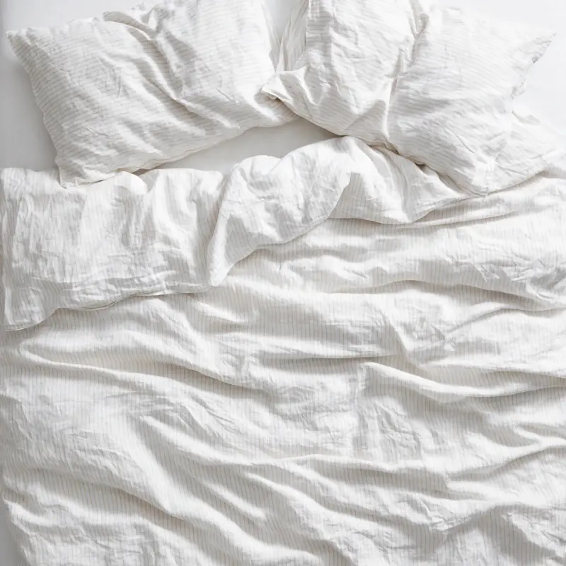 White European linen bedding with a relaxed rumpled look
